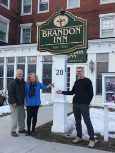 Owners in front of the Brandon Inn